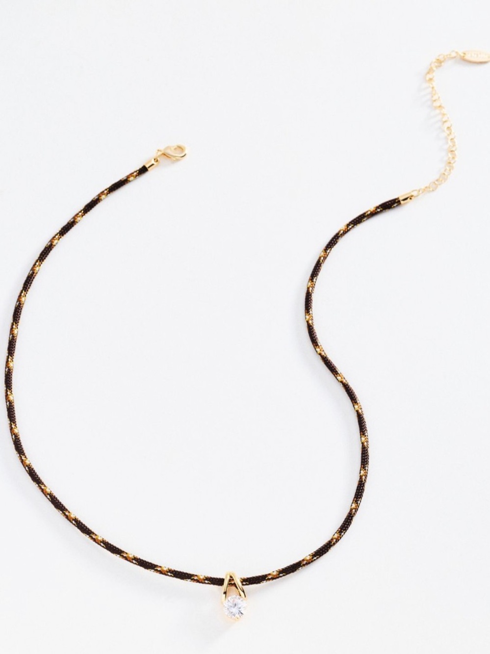 Anthropologie brown color cord necklace with CZ pendant